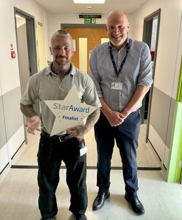 Star Award winner Andy Smith receiving his award from the Trust's Chief Executive, Simon Morritt.