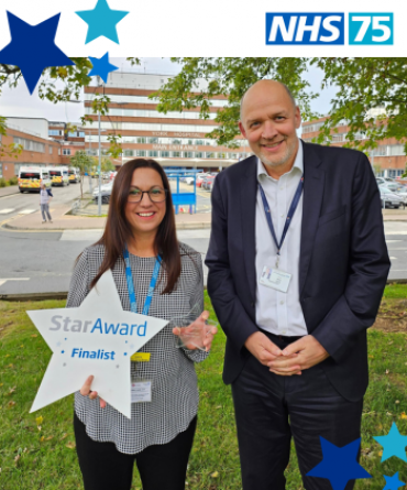 Star Award winner Laura Blissett receiving her award from Simon Morritt, the Trust's Chief Executive.