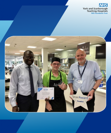 Paul Williams receiving his Star Award and certificate from Simon Morritt, Chief Executive